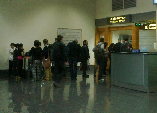 Travelers are getting visa stamped at Noi Bai airport, Hanoi, Vietnam