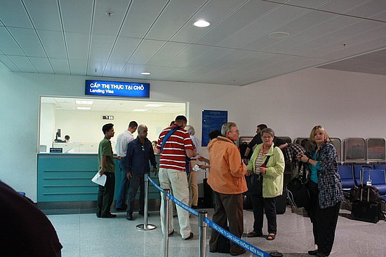 Travelers are getting visa stamped at Tan Son Nhat airport, Ho Chi Minh City, Vietnam